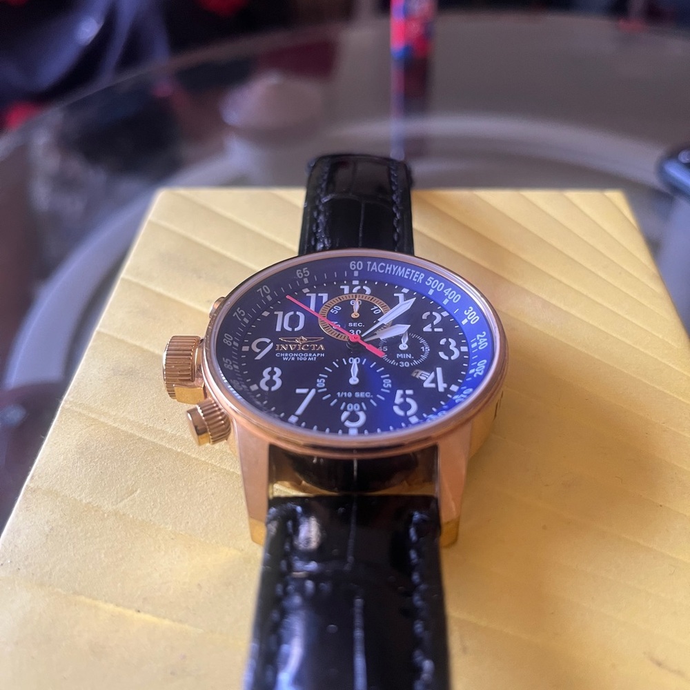 Invicta Gold and Black Chronograph Watch